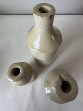 Load image into Gallery viewer, A Set of Three Stonewear Pots.
