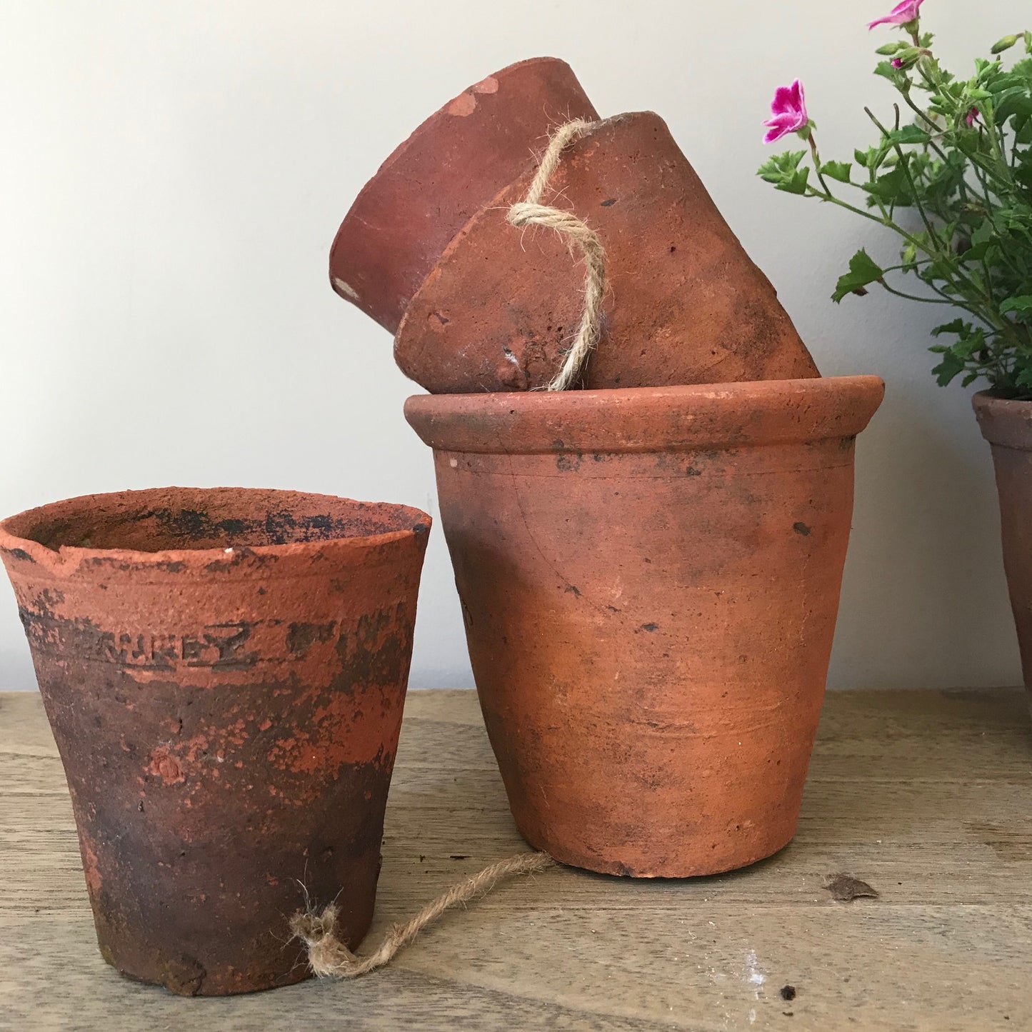 Set Of Four Early Terracotta Pots.